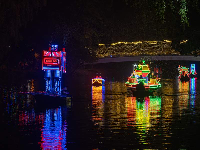 Illuminated boats on the river