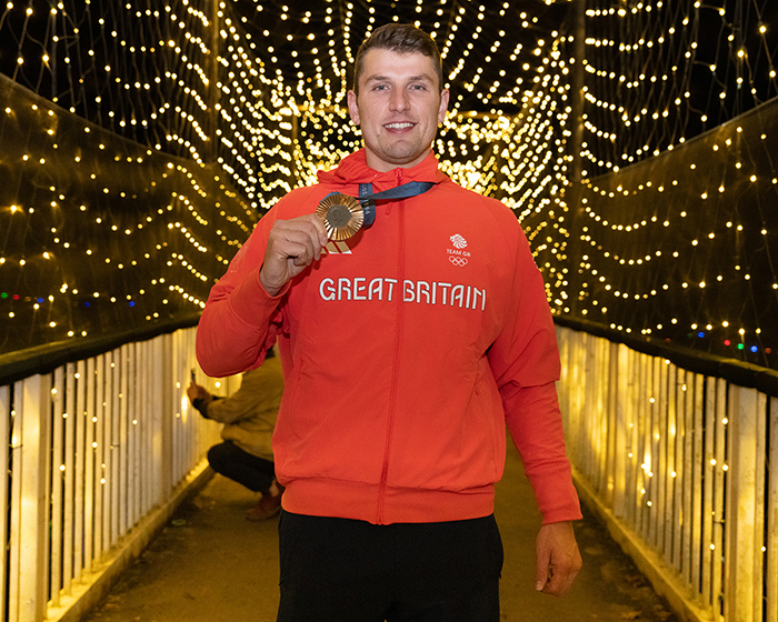 oli wilkes with medal tunnel of lights 700px